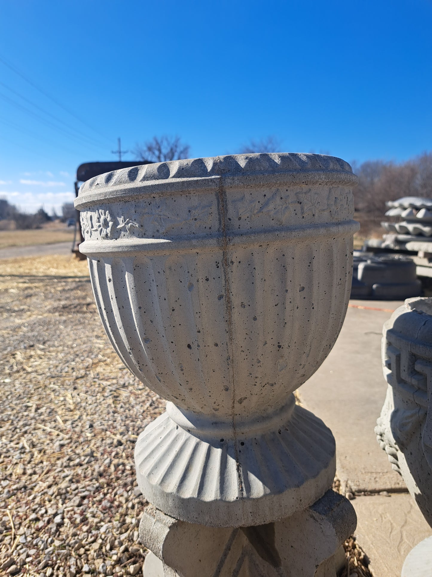 Locally custom poured concrete planters, benches, and pavers