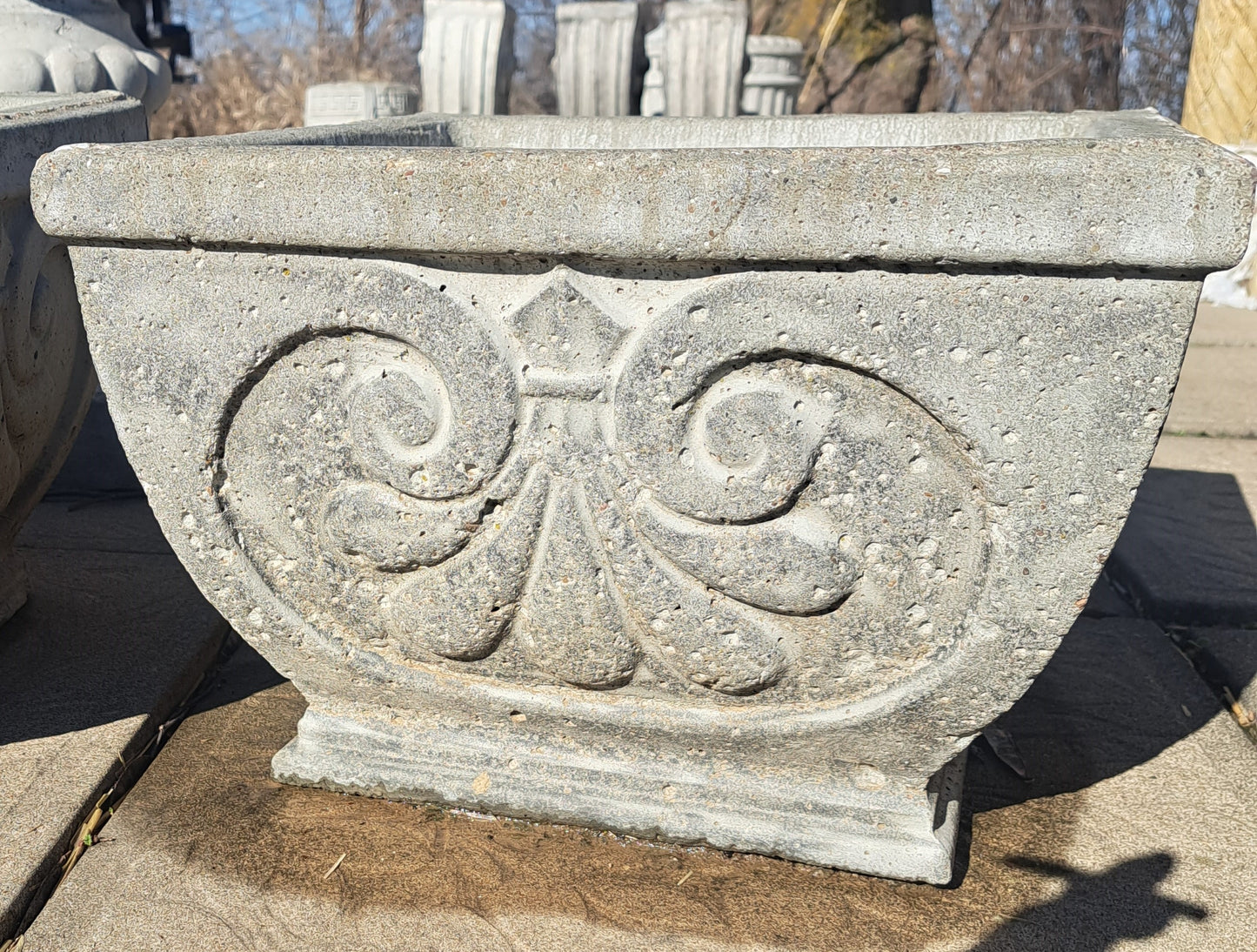 Locally custom poured concrete planters, benches, and pavers