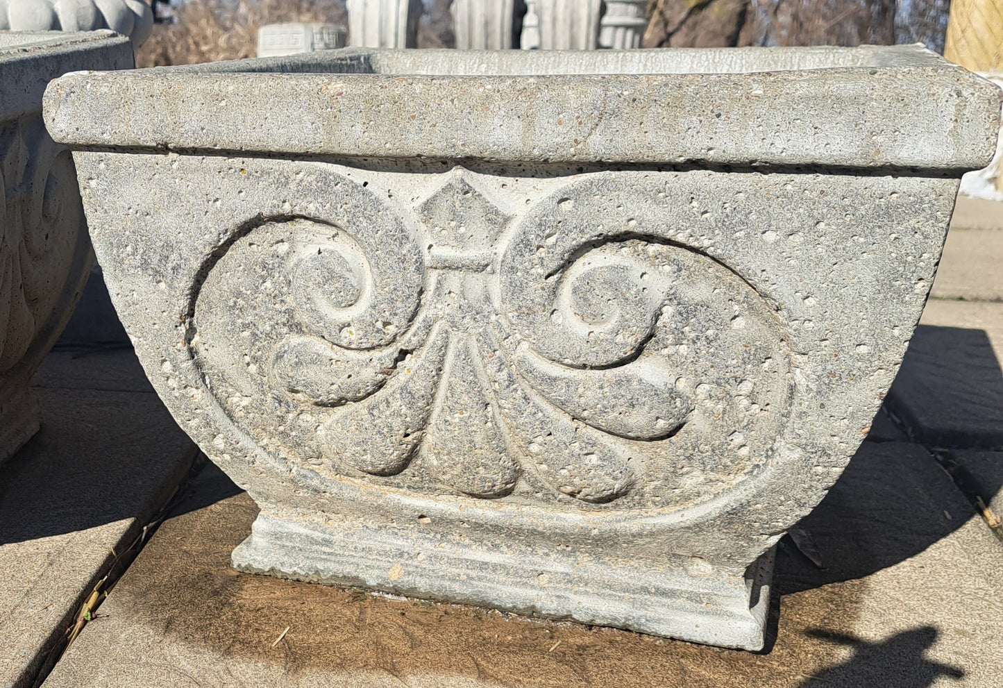 Locally custom poured concrete planters, benches, and pavers